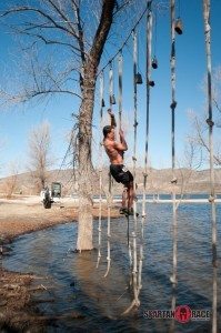 David Glover climbing at a Spartan Race