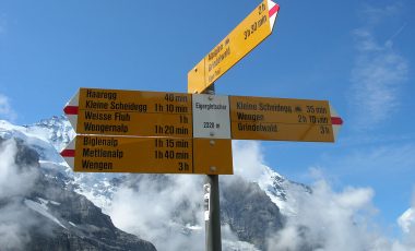 directional signs in the alps