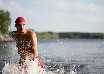 mid-shot-man-running-lake