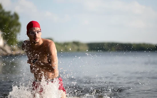 mid-shot-man-running-lake
