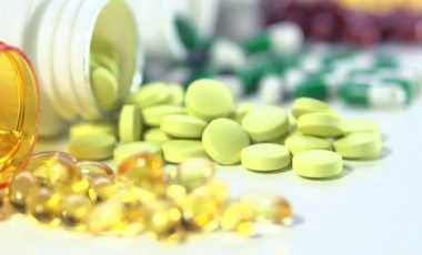 pills spilling out of pill bottle