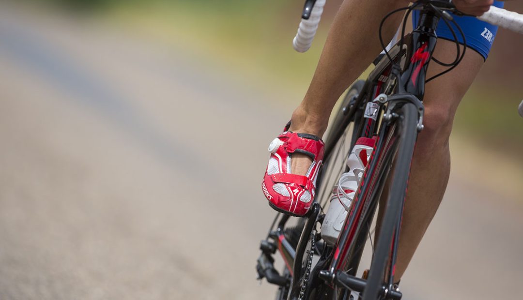 triathlete pedaling on a bike